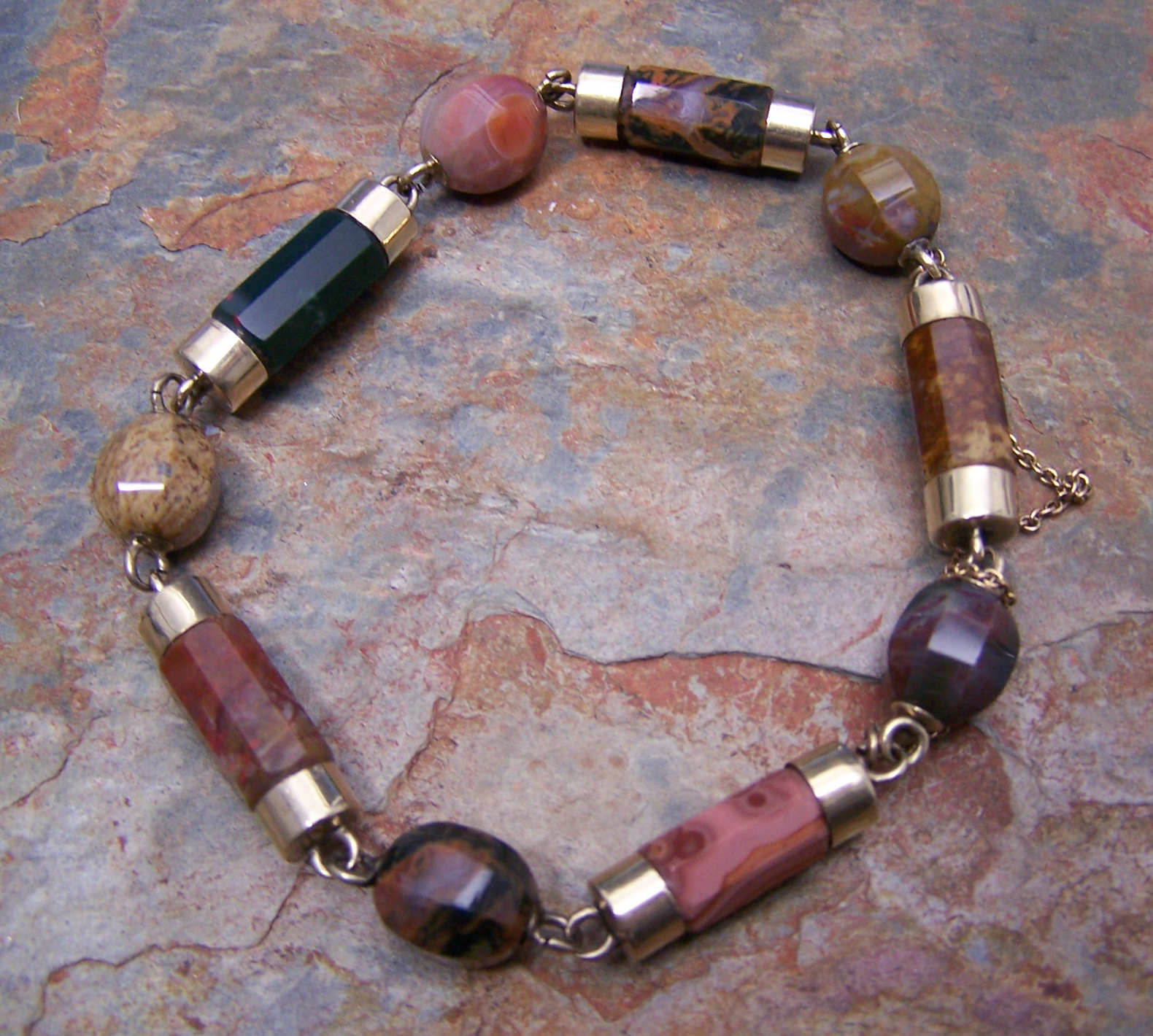 A Scottish gold mounted pebble bracelet,