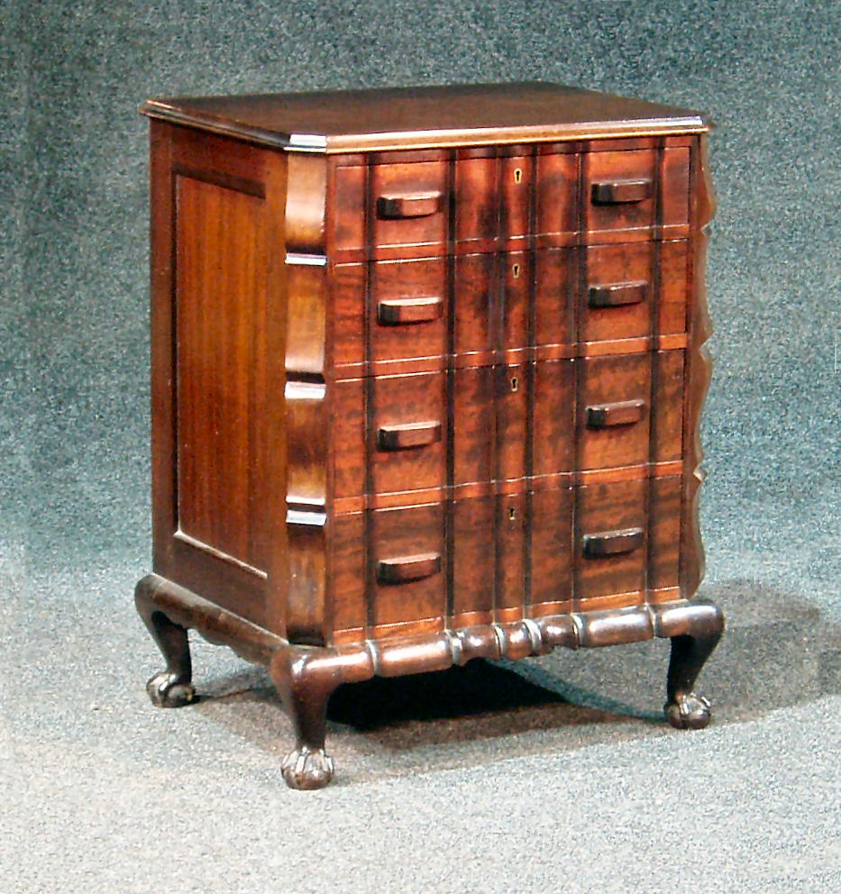 A 20th century small mahogany chest