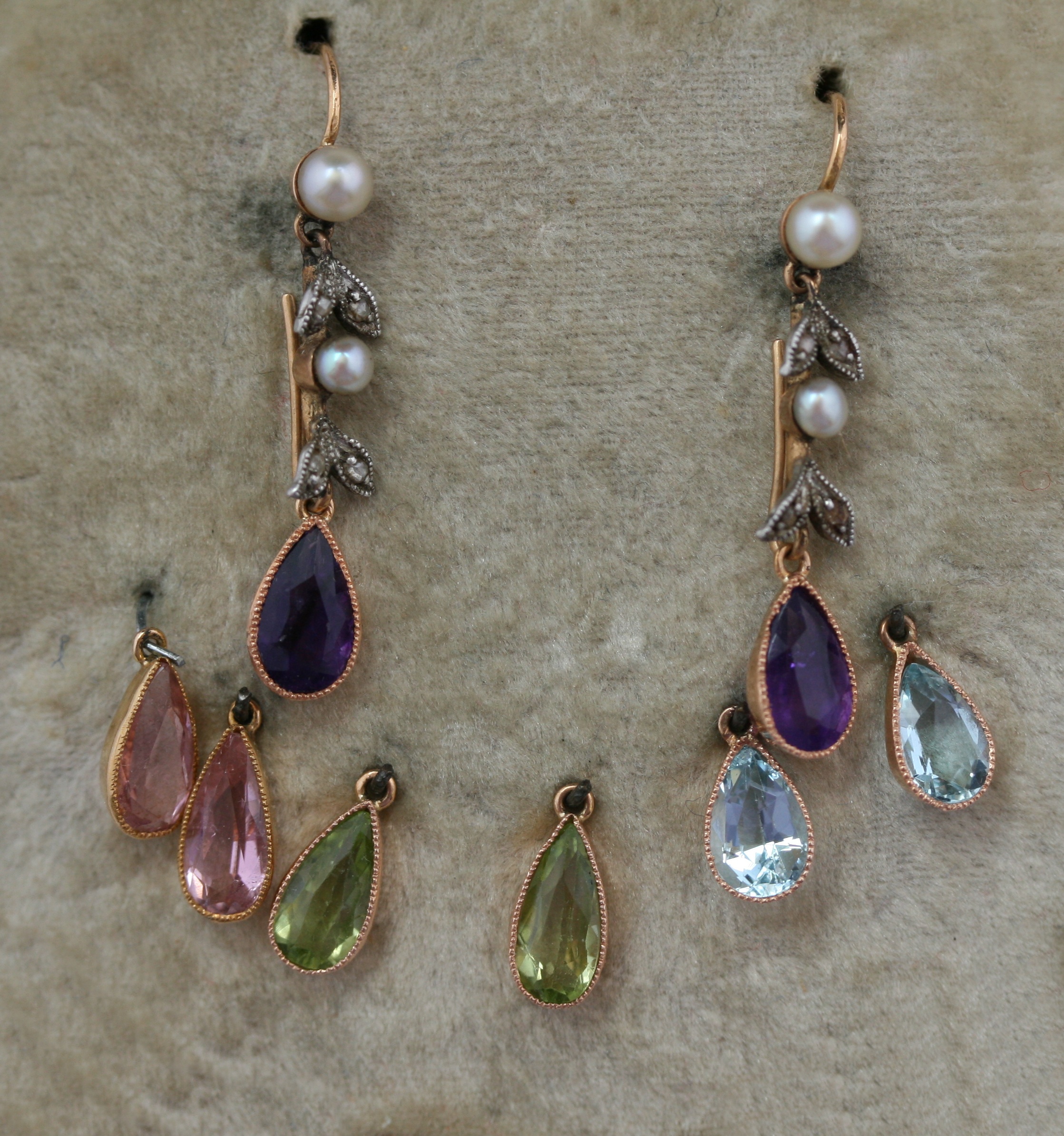 A cased set of Edwardian multi-gem pendant earrings