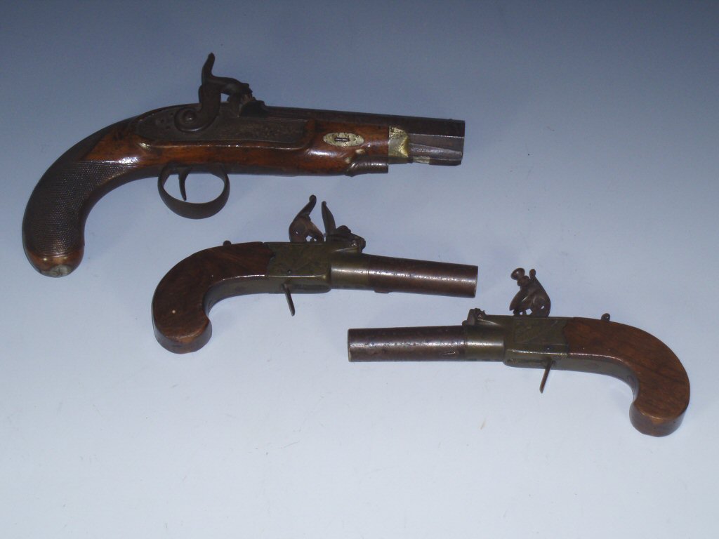 A pair of late 18th century flintlock boxlock turn off pocket pistols By Davidson, London