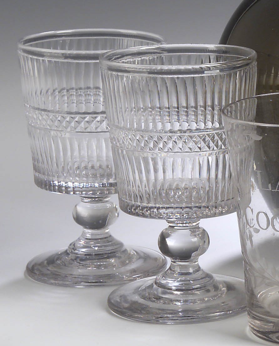 A set of six Regency glass rummers