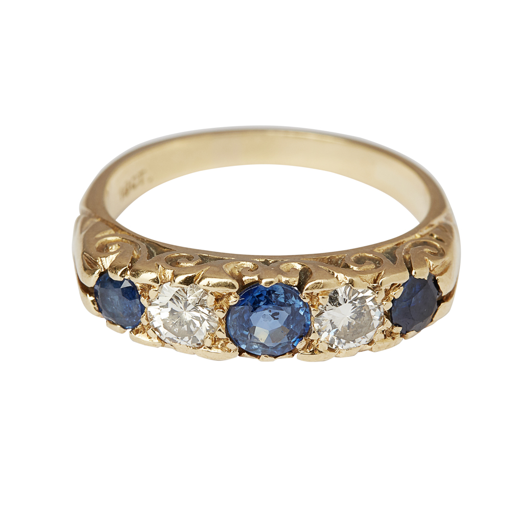 A sapphire and diamond set half eternity ring
