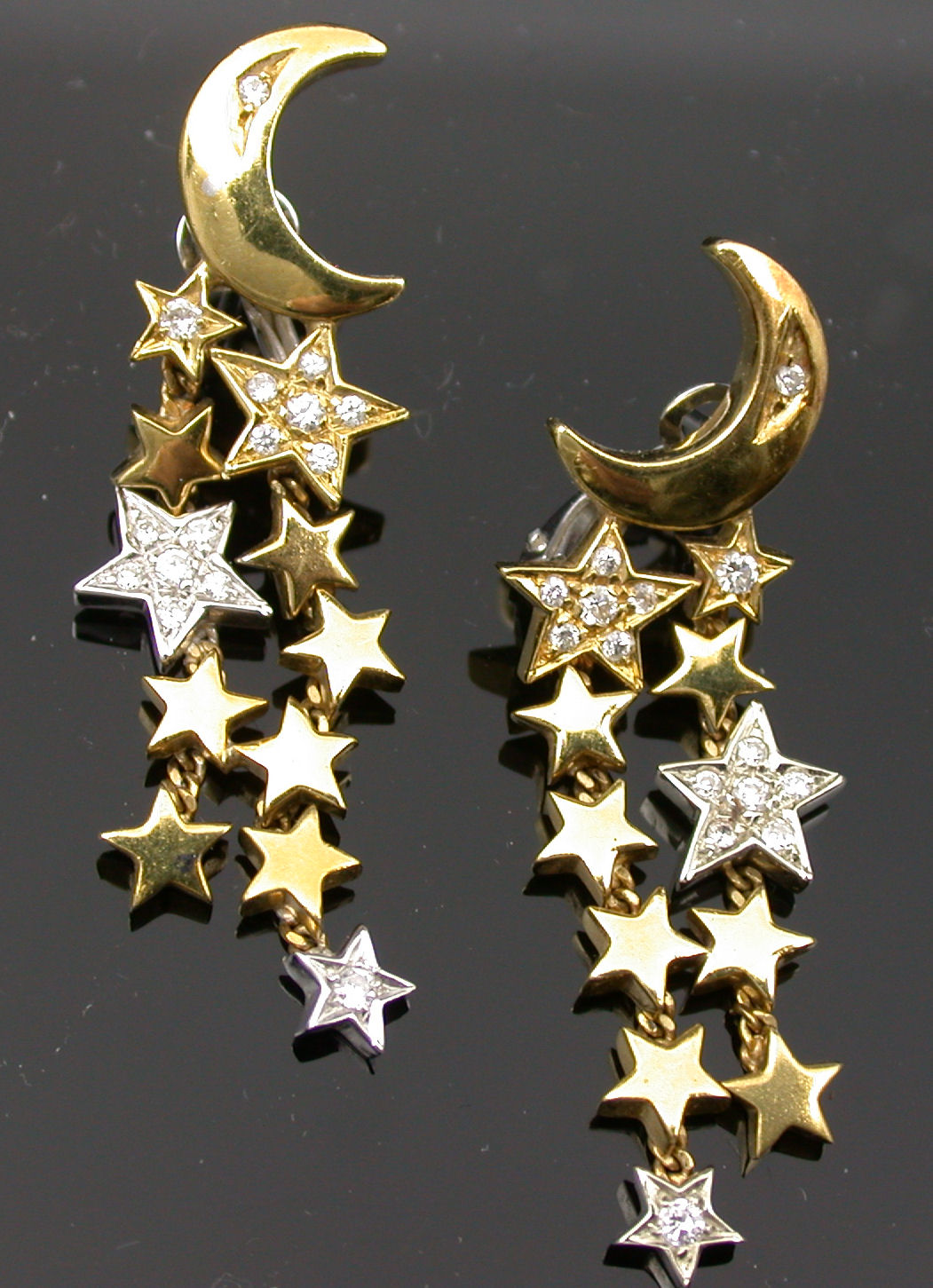 A pair of Italian gold and diamond pendant earrings,