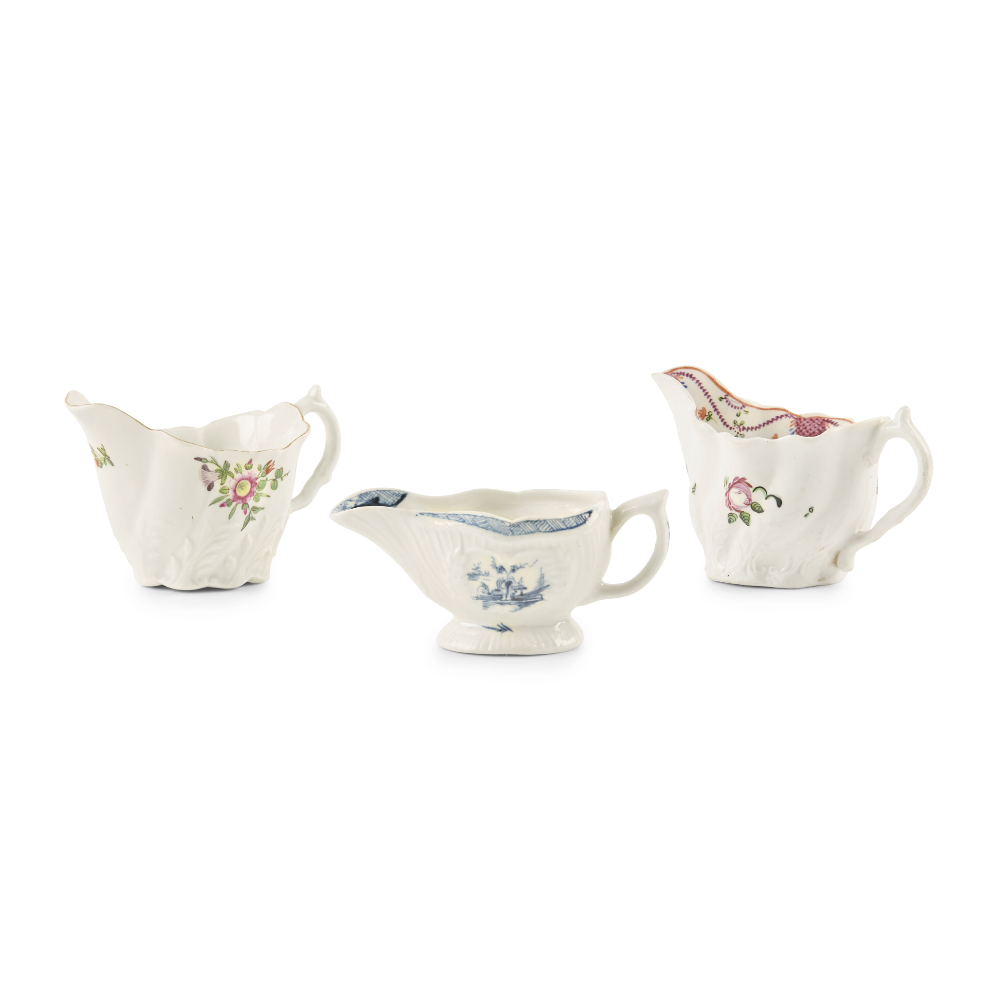 TWO ENGLISH PORCELAIN 'CHELSEA' EWERS AND A LOWESTOFT CREAM EWER