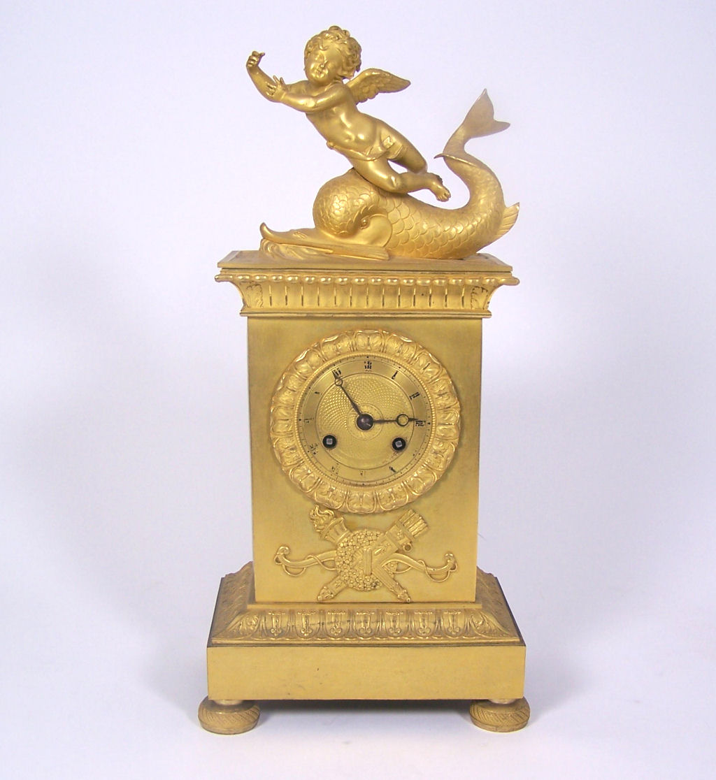 A French Empire gilt bronze mantel clock