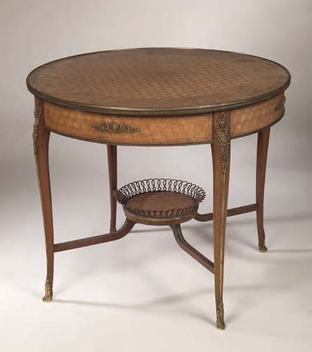 An Edwardian kingwood parquetry inlaid centre table,