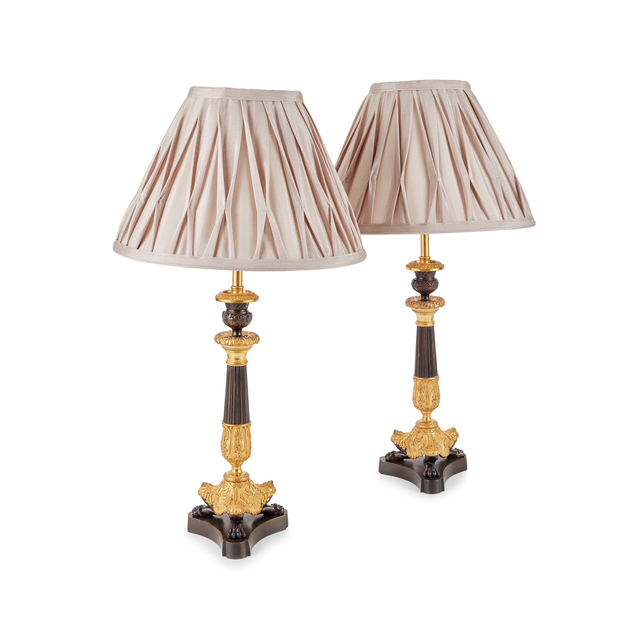 PAIR OF PATINATED BRONZE AND GILT METAL LAMPS