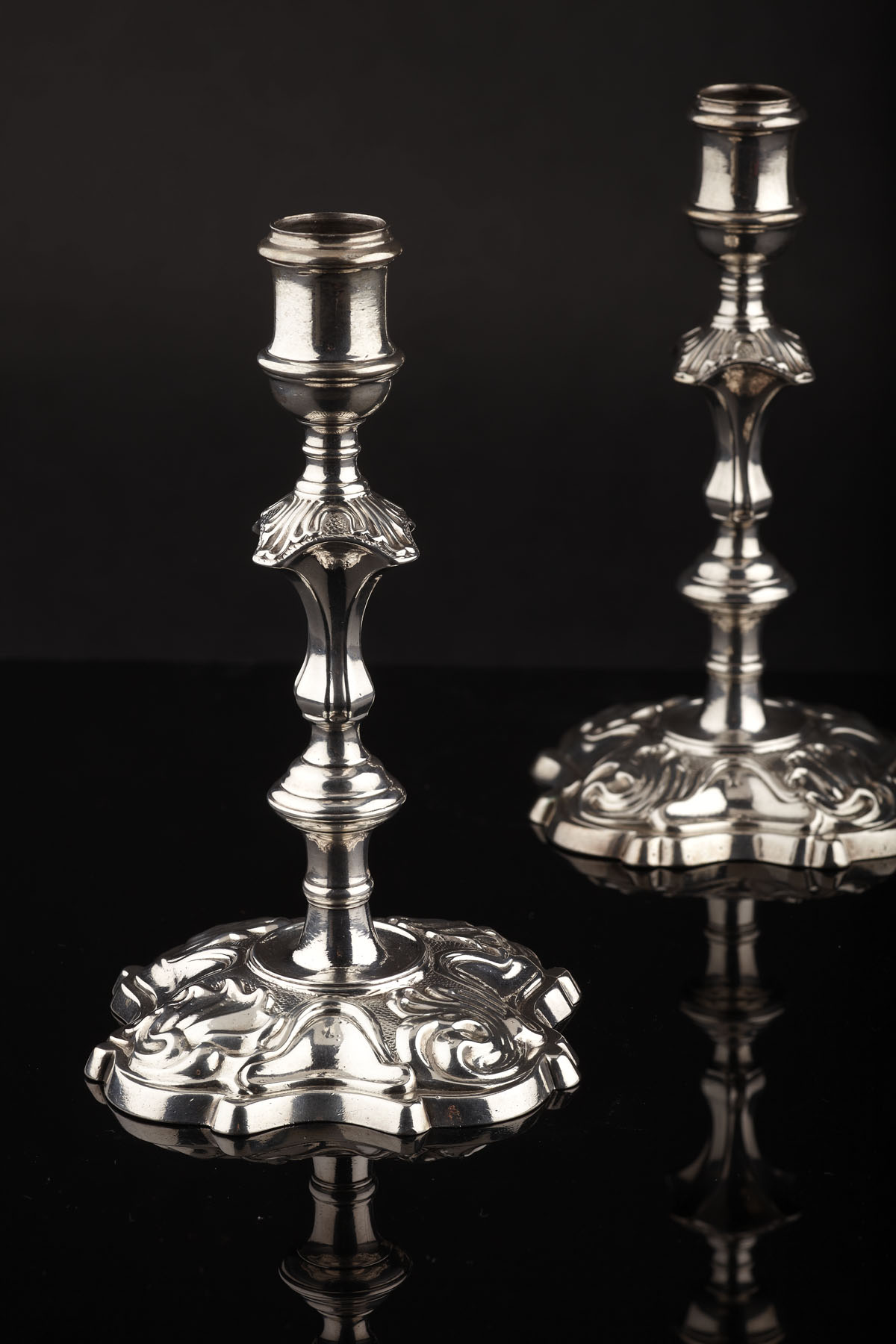 A pair of George II candlesticks