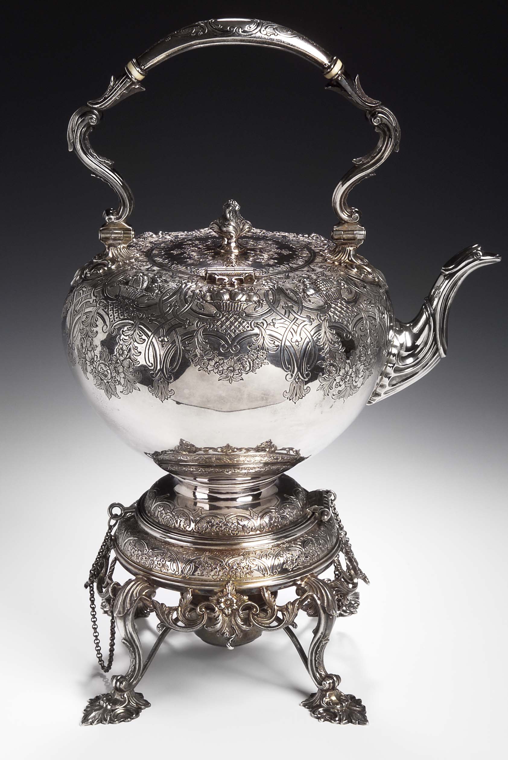 A Victorian Scottish tea kettle on stand with burner,