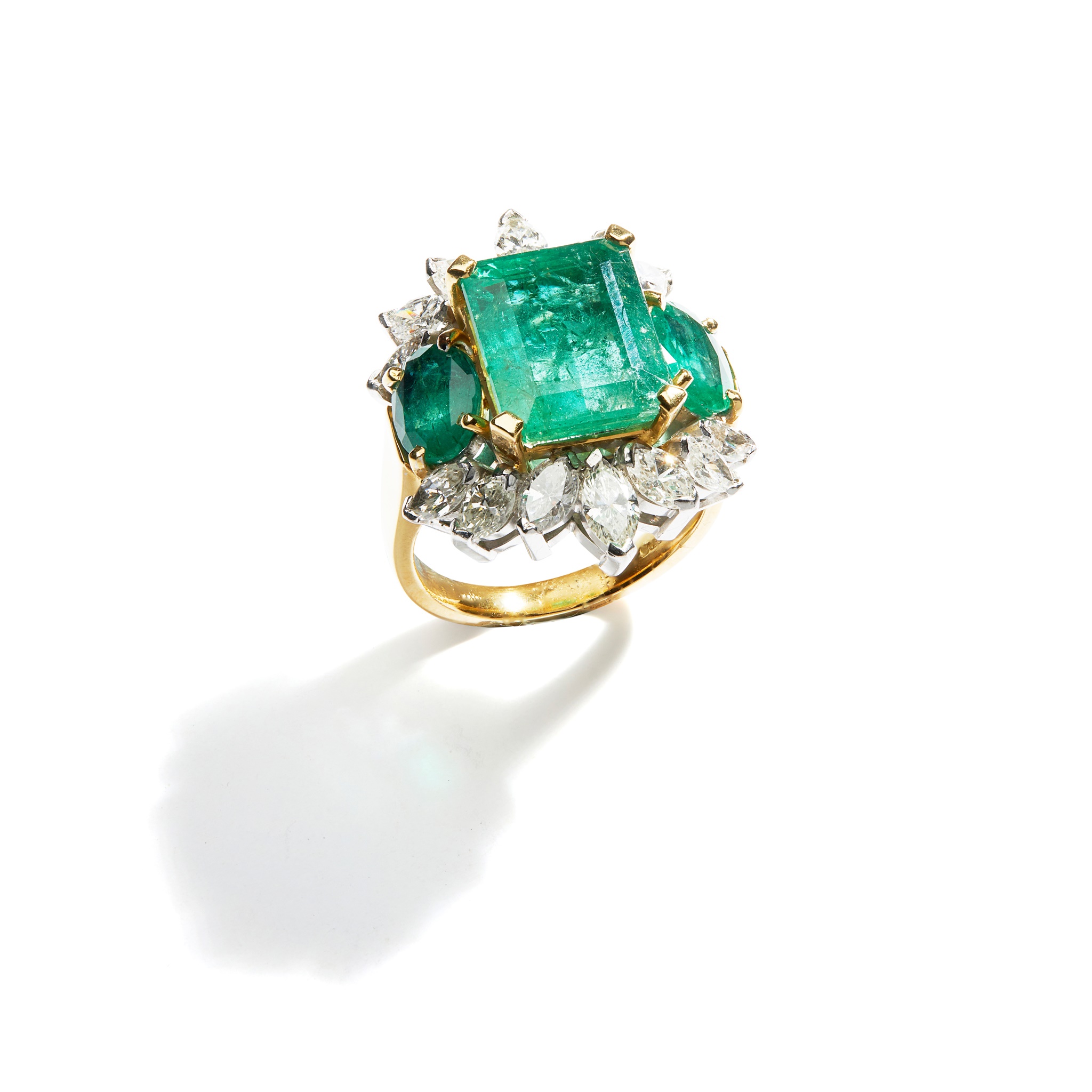 An emerald and diamond dress ring, by Eric N Smith