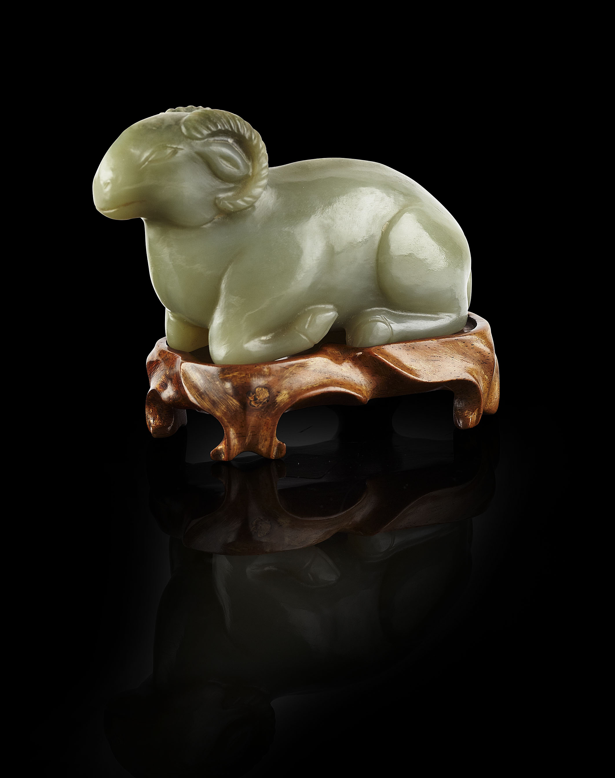 CHINESE CARVED JADE FIGURE OF A RECUMBENT RAM