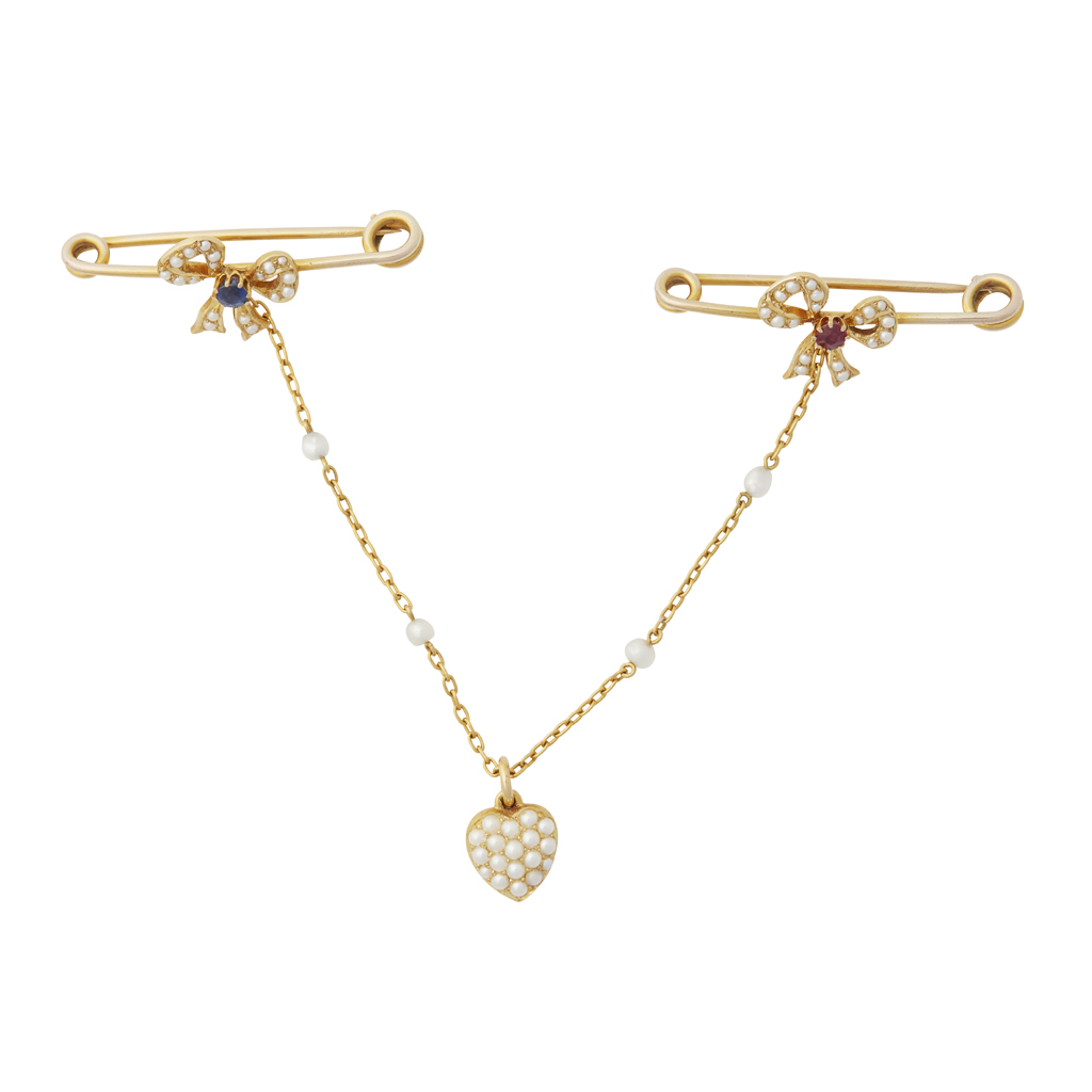 A multi-gem set double-bow brooch