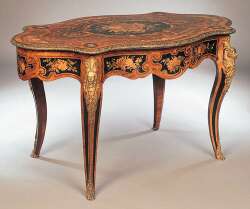A Victorian marquetry centre table in the Louis XV style