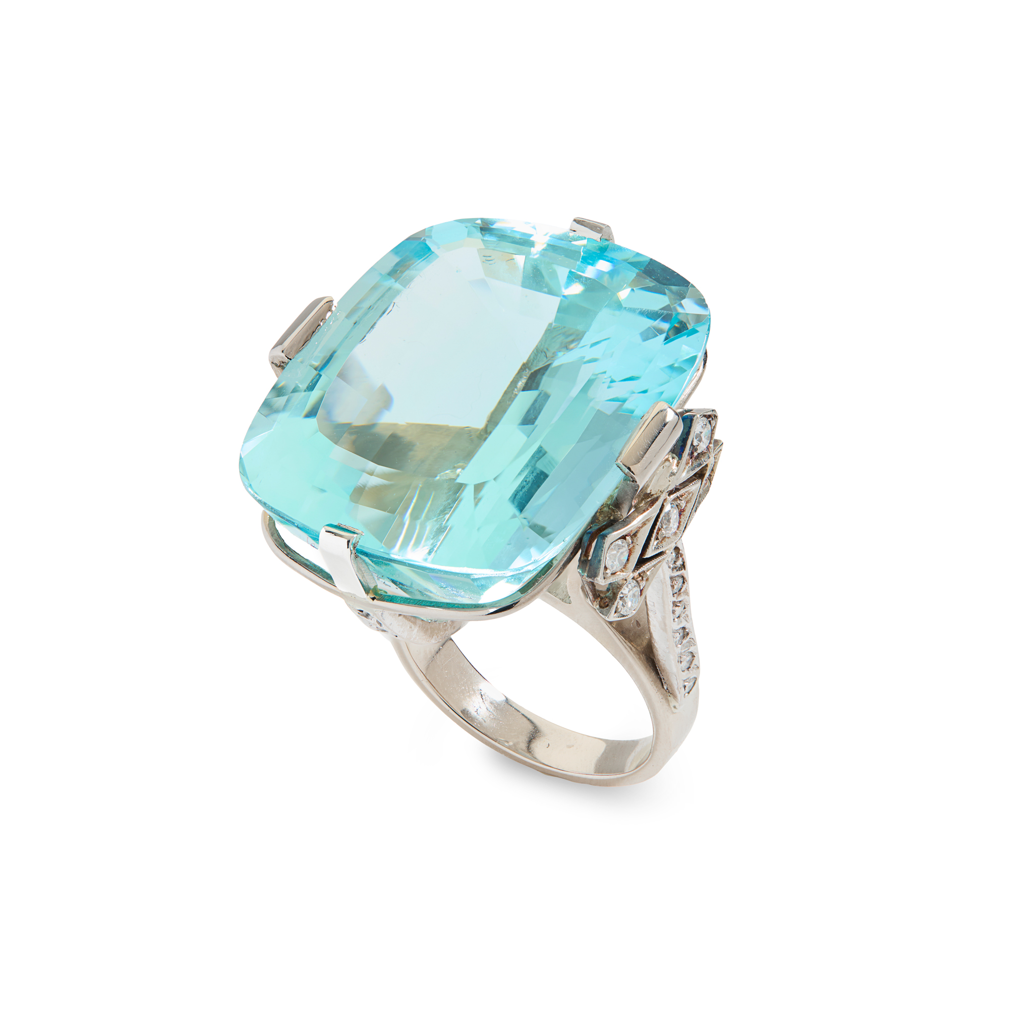 A large 18ct gold aquamarine and diamond cocktail ring