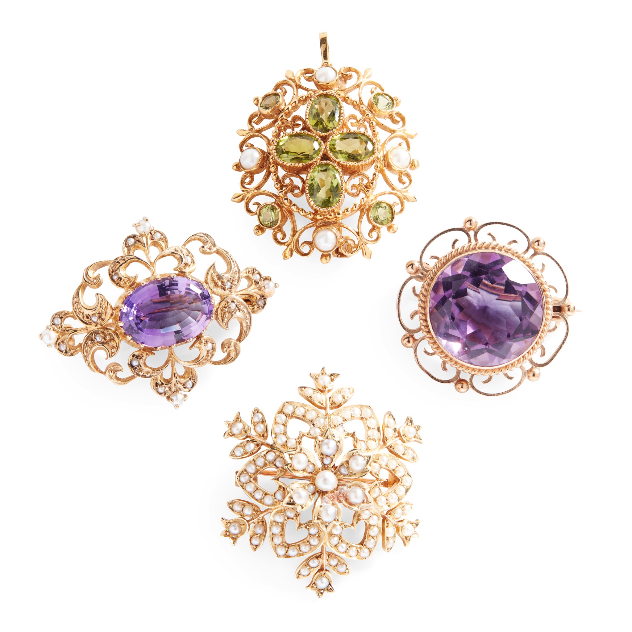 A collection of gem-set brooches