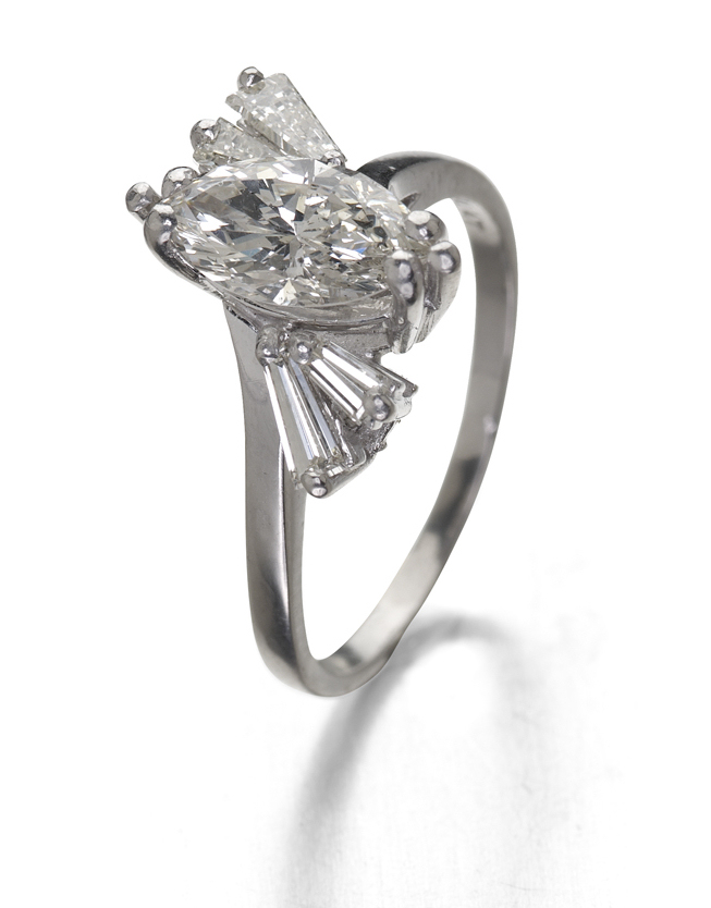 A platinum mounted diamond cluster ring,