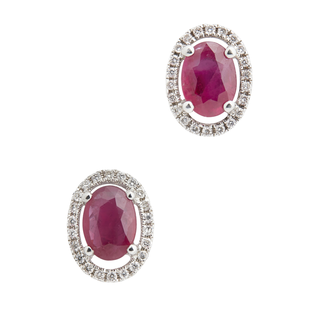 A pair of ruby and diamond set earrings