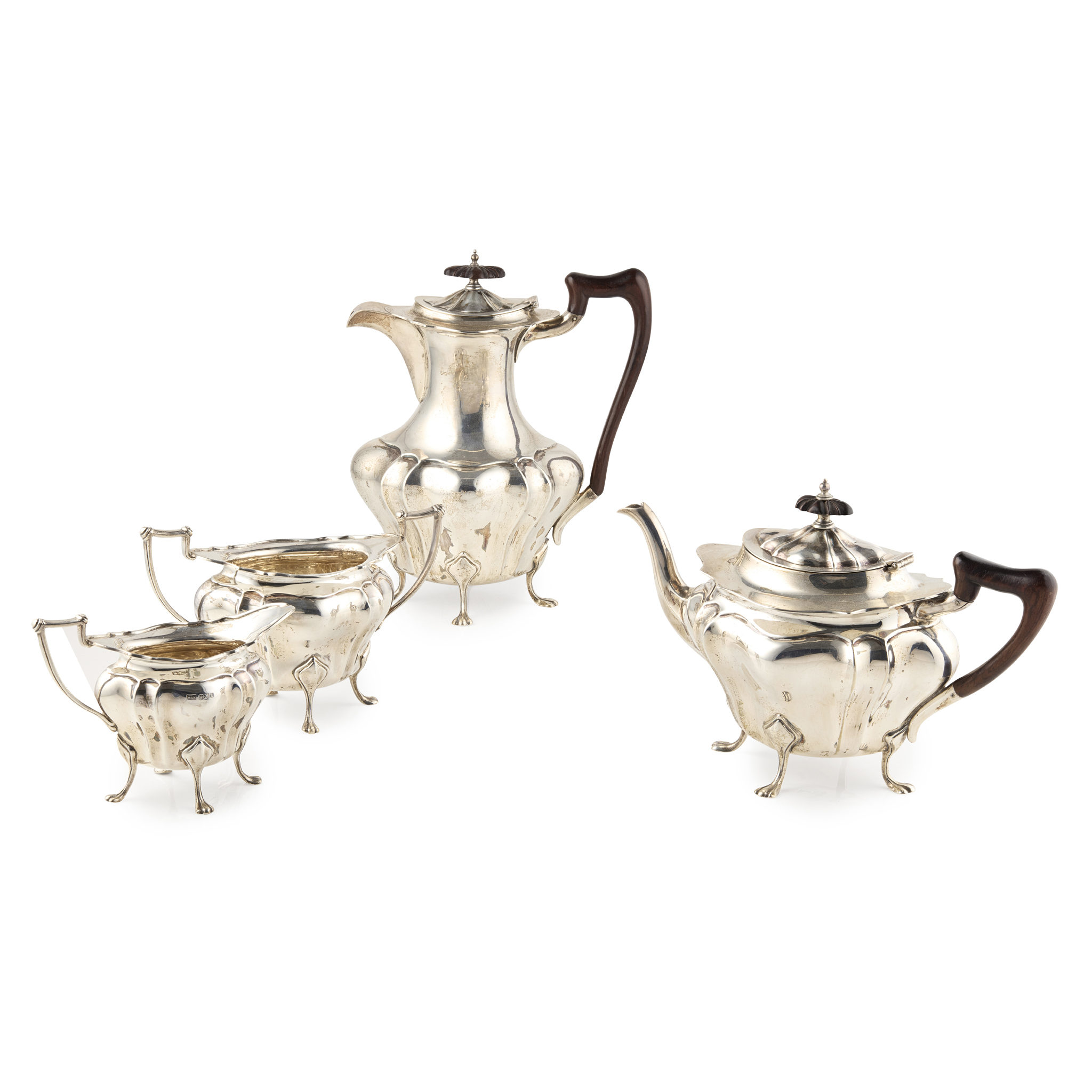 A GEORGE V MATCHED FOUR PIECE TEA SERVICE