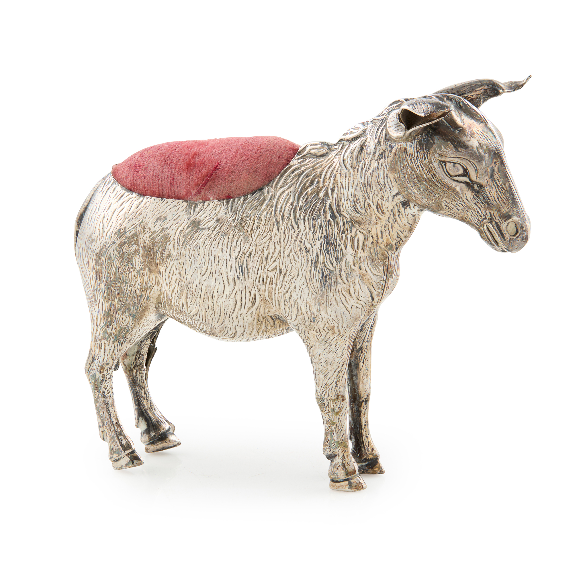 AN EDWARDIAN DONKEY PIN CUSHION