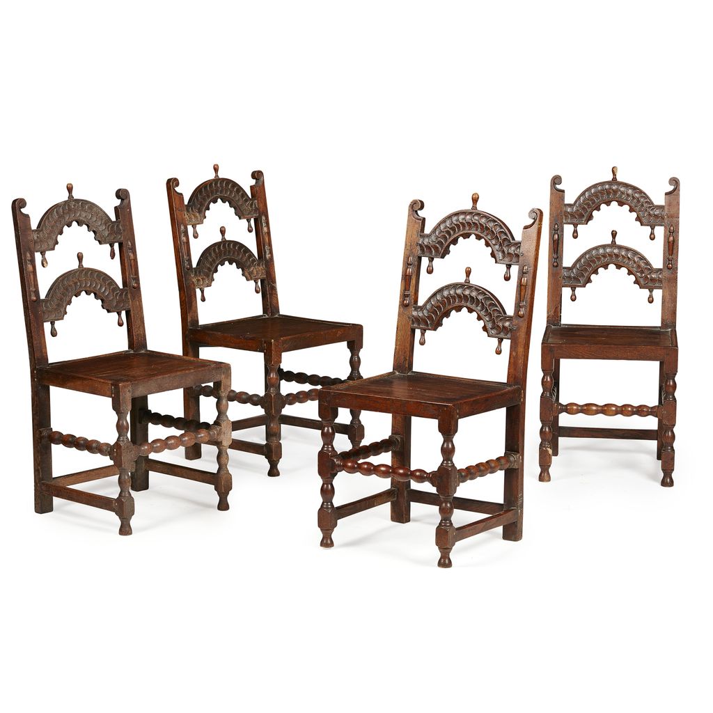 MATCHED SET OF FOUR SOUTH YORKSHIRE CARVED OAK BACK STOOLS