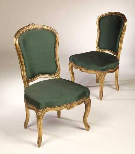 A pair of Louis XV style giltwood side chairs,