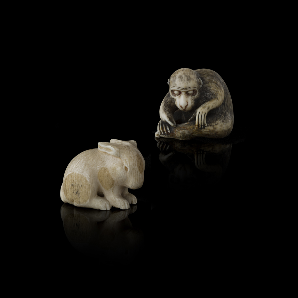 IVORY NETSUKE OF A MONKEY