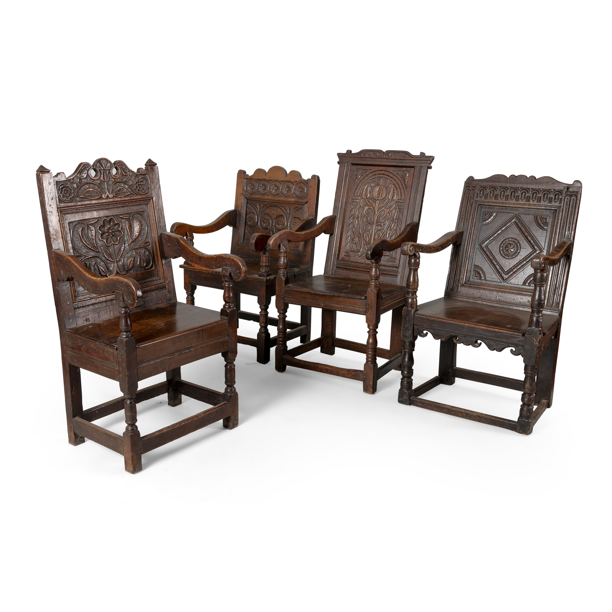 A GROUP OF FOUR OAK WAINSCOT CHAIRS