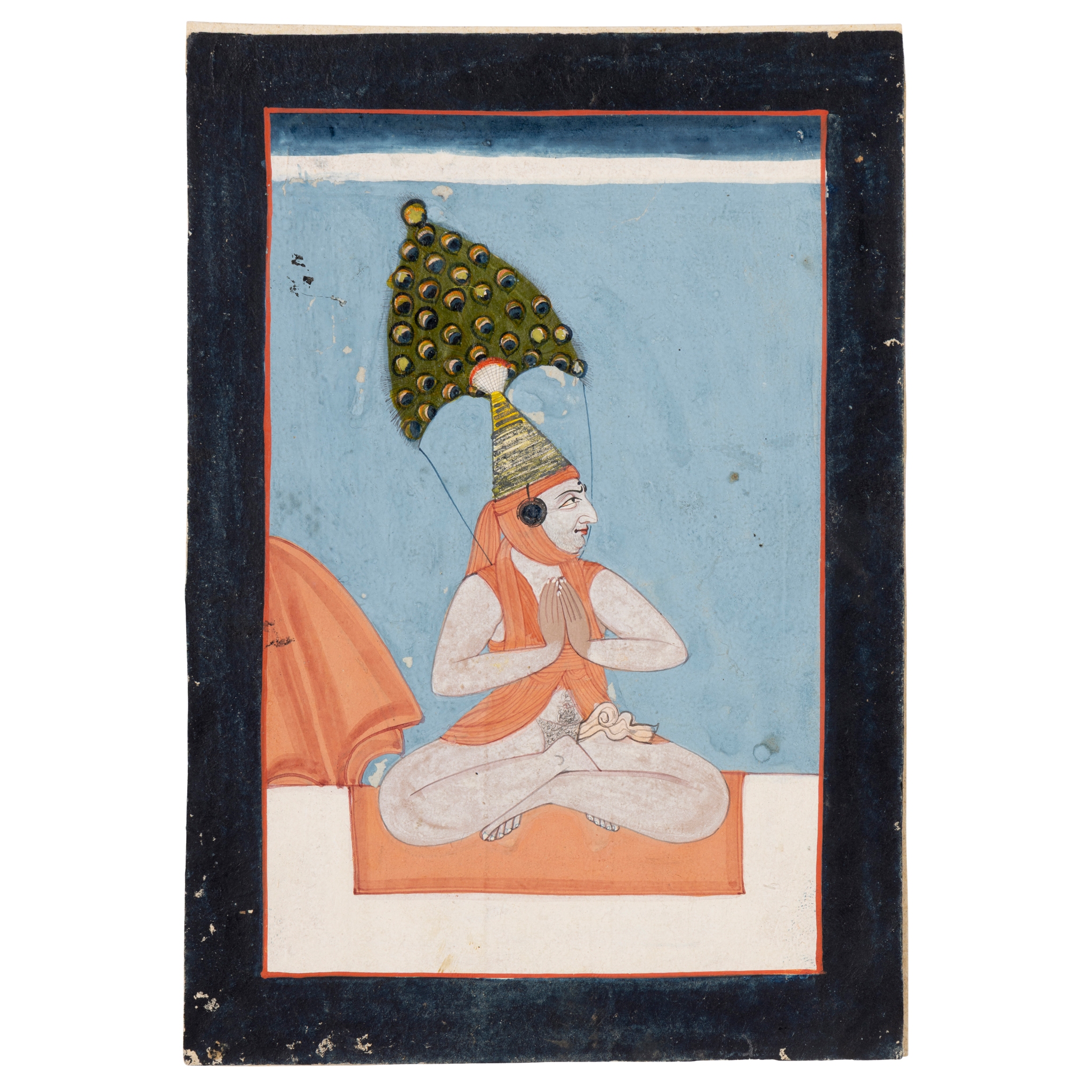 AN ASCETIC SEATED ON A TERRACE