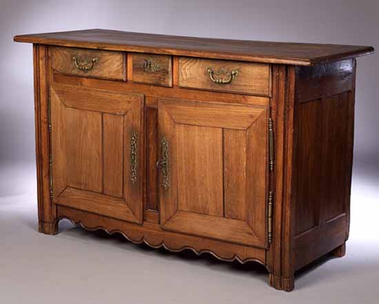 An 18th century French provincial fruitwood cabinet