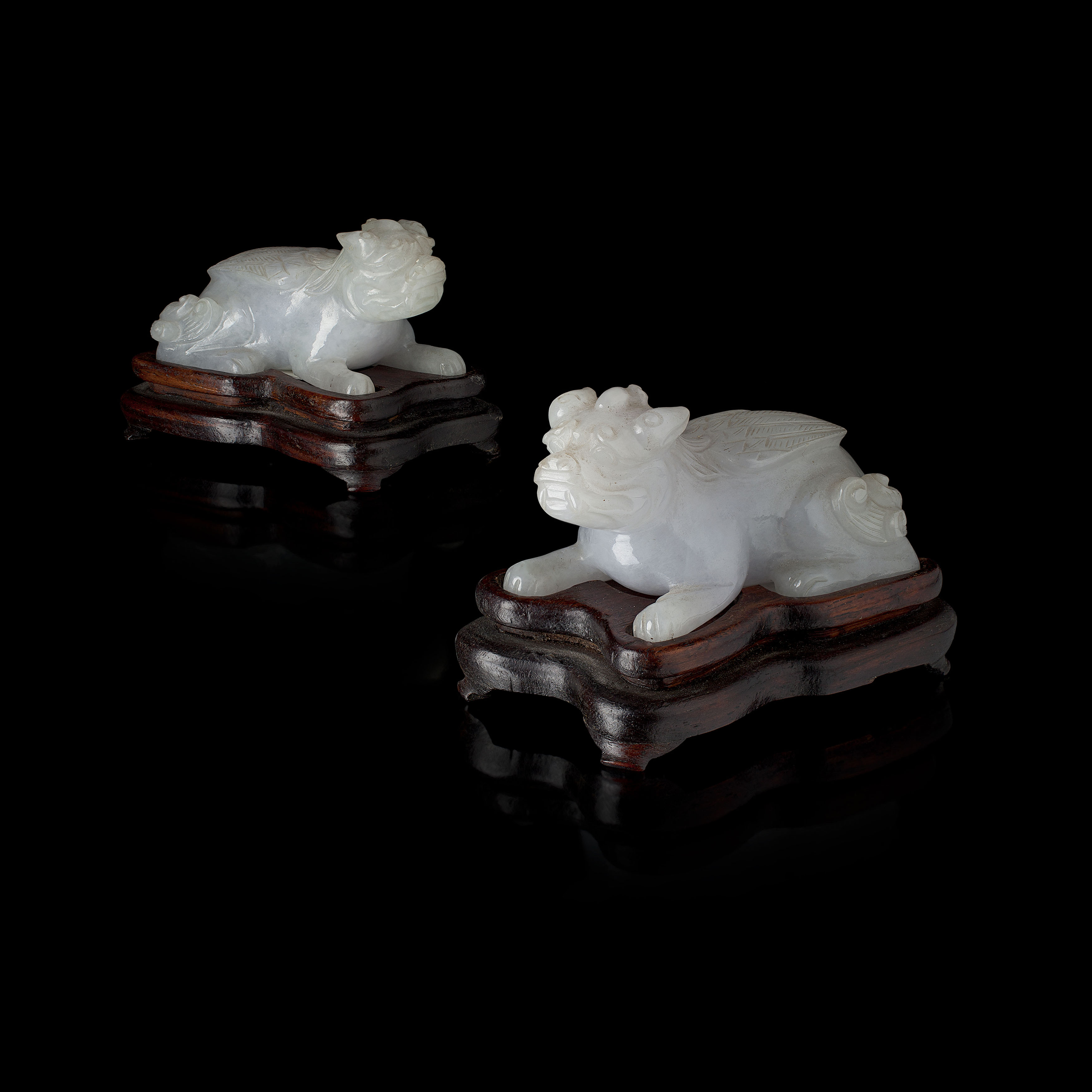 PAIR OF CHINESE LAVENDER JADE WINGED MYTHICAL BEASTS