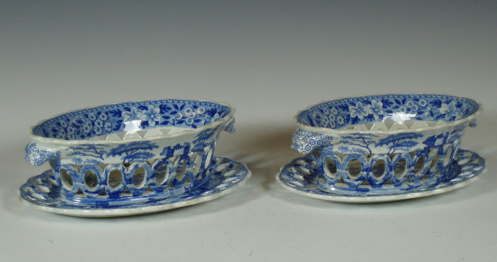 A pair of 19th century Spode blue printed baskets and underplates