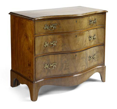 A George III mahogany serpentine chest