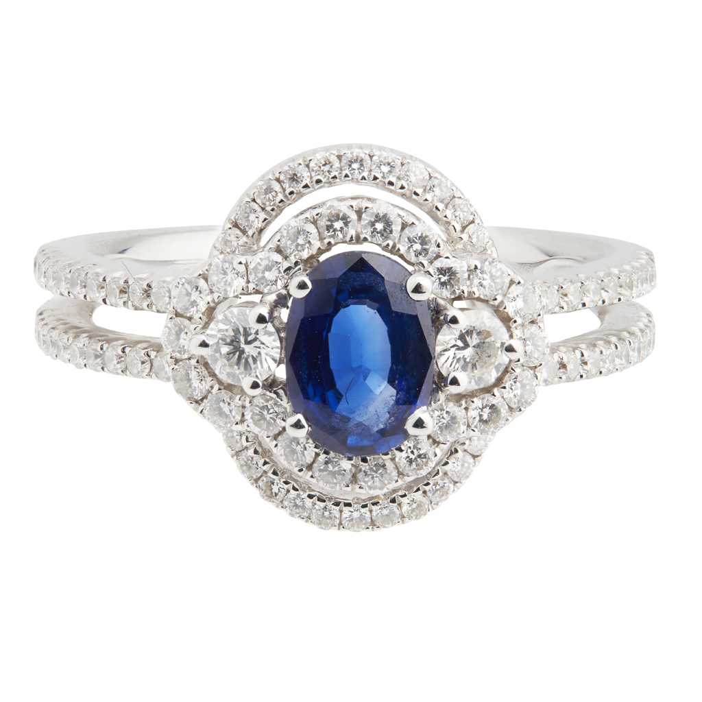 An 18ct white gold sapphire and diamond set cluster ring