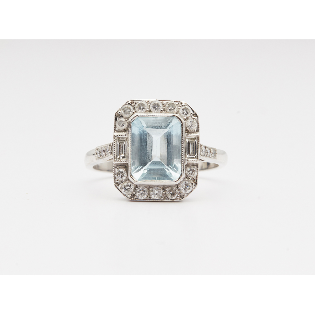 An aquamarine and diamond set cocktail ring
