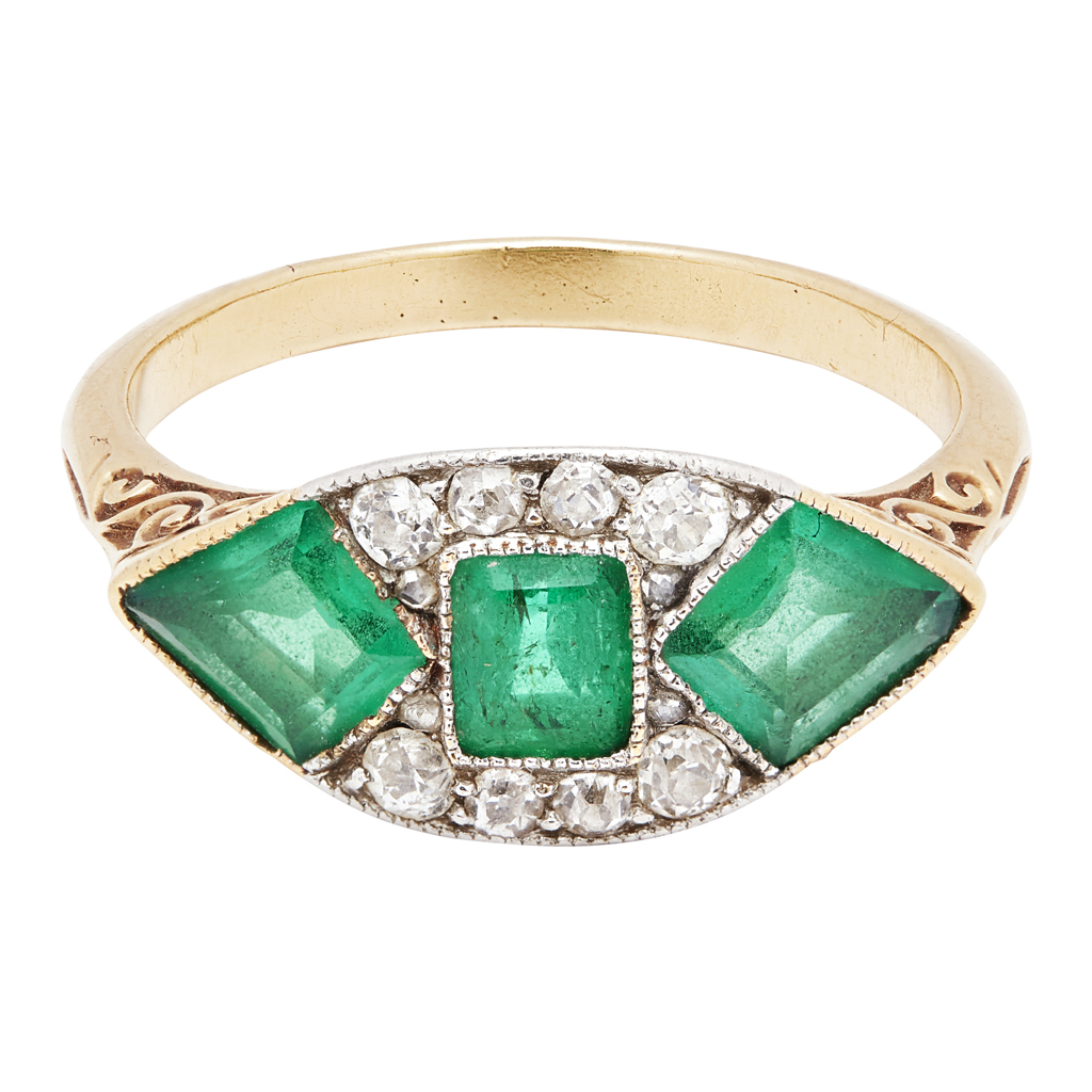 An early 20th century emerald and diamond set ring