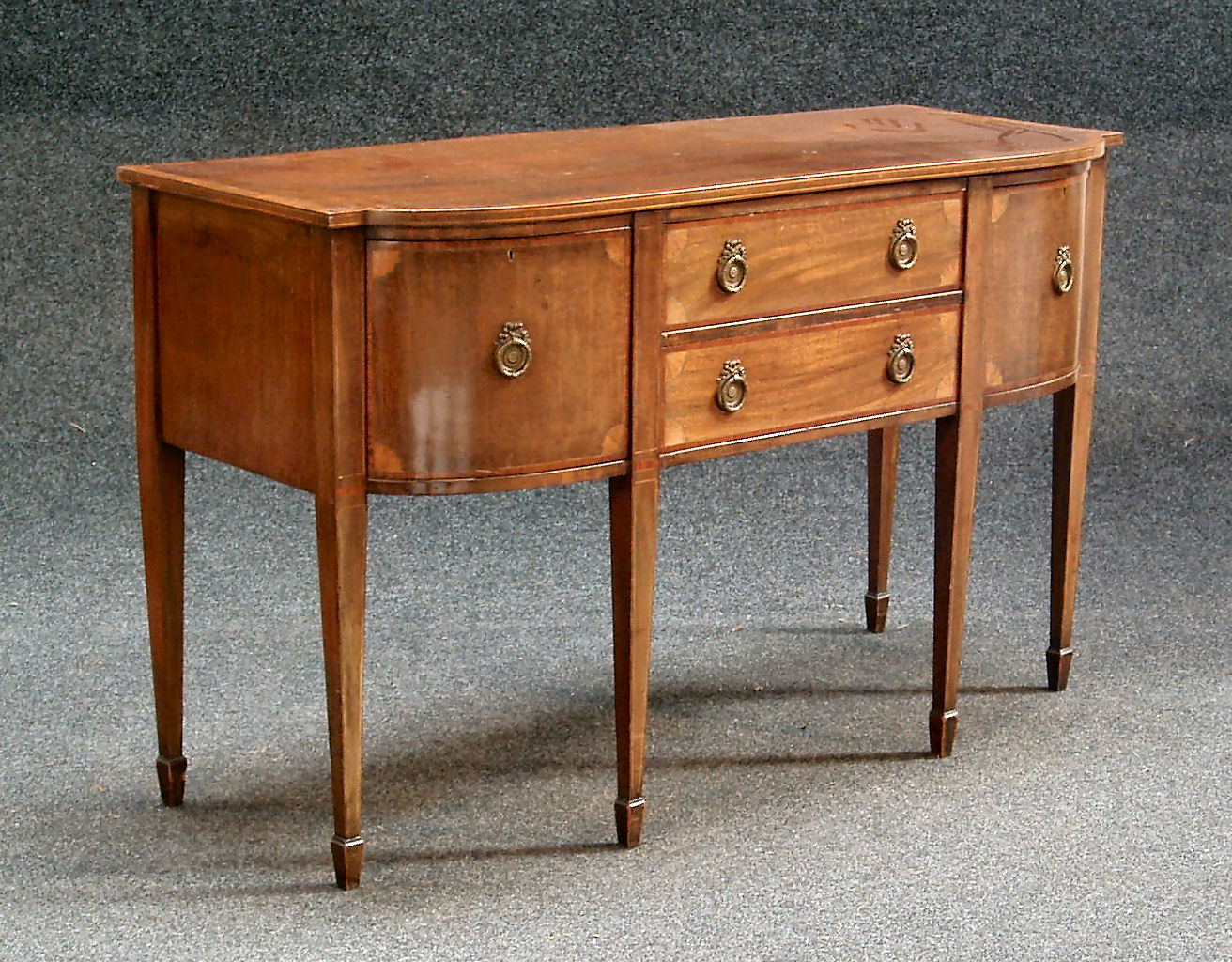 A Georgian bowfront sideboard,