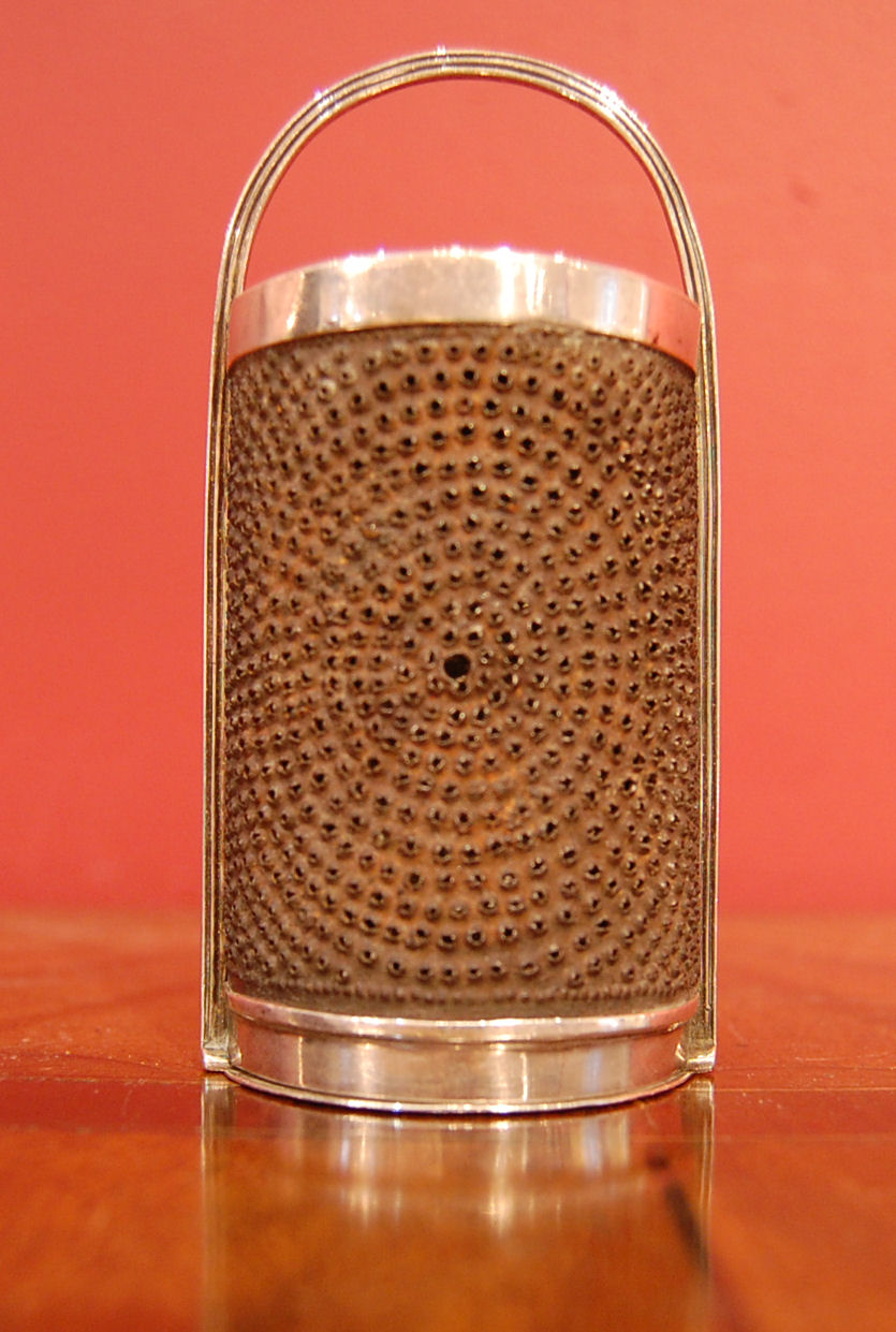 A George III silver nutmeg grater