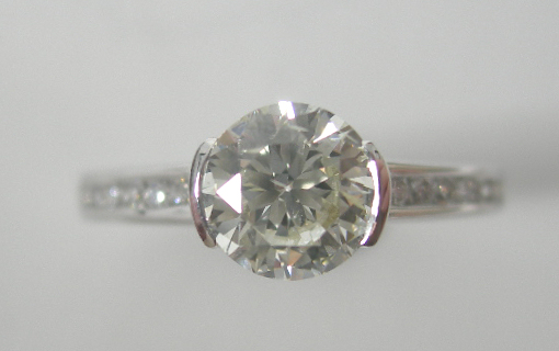 An 18ct white gold mounted diamond single-stone ring,