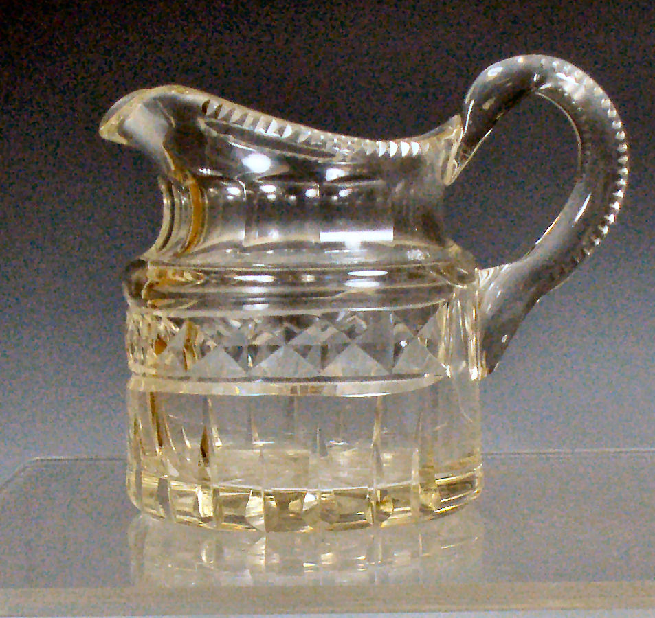 A Georgian cut glass water jug
