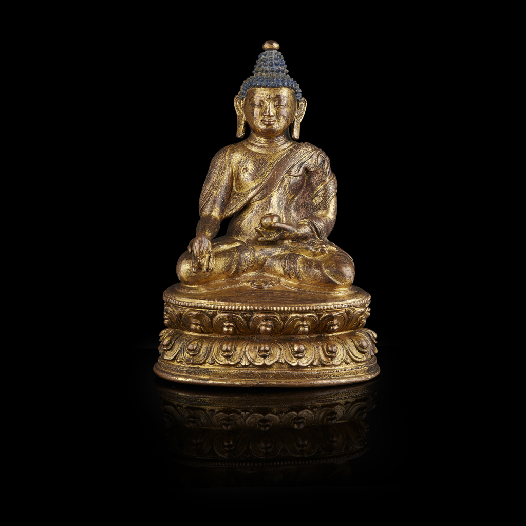 SINO-TIBETAN GILT-BRONZE FIGURE OF BHAISAJYAGURU, THE BUDDHA OF MEDICINE