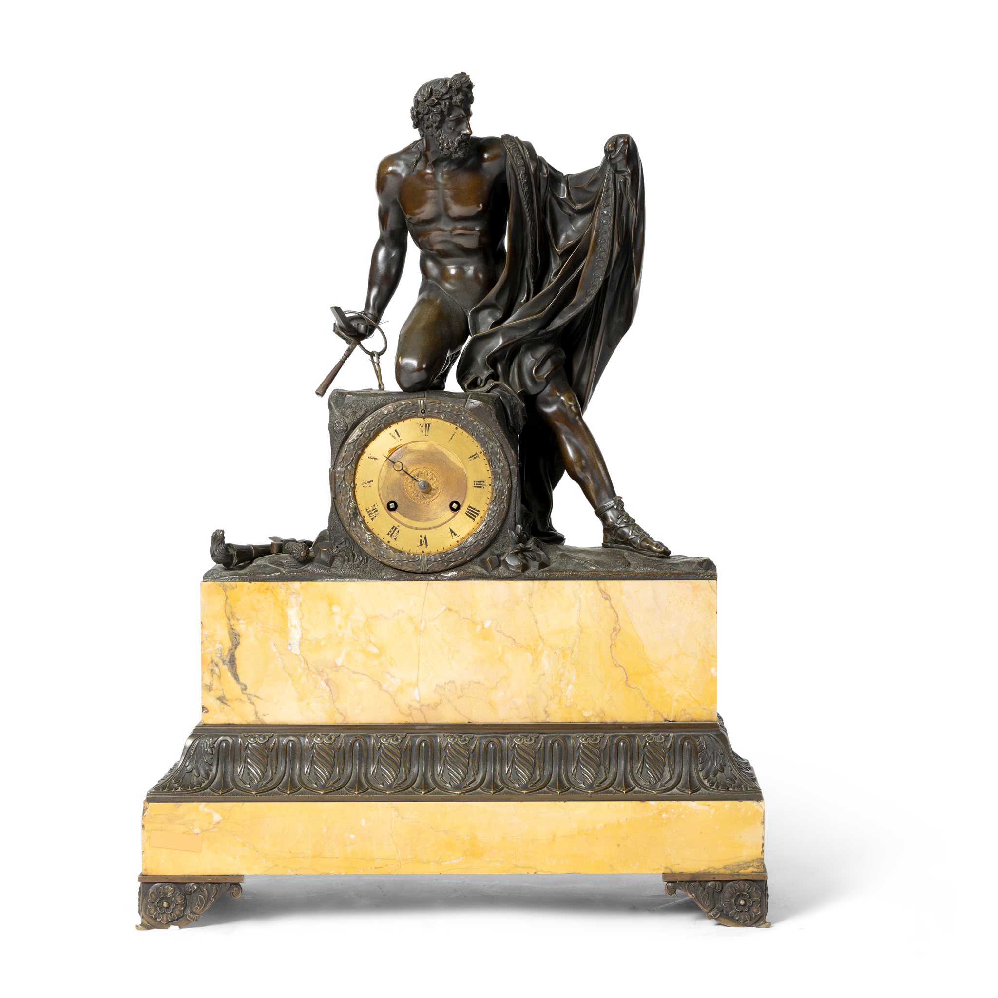 A FRENCH BRONZE AND SIENNA MARBLE MANTEL CLOCK