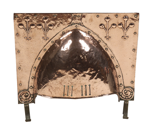 An Arts and Crafts copper fireplace hood,