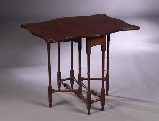 An Edwardian mahogany Sutherland table