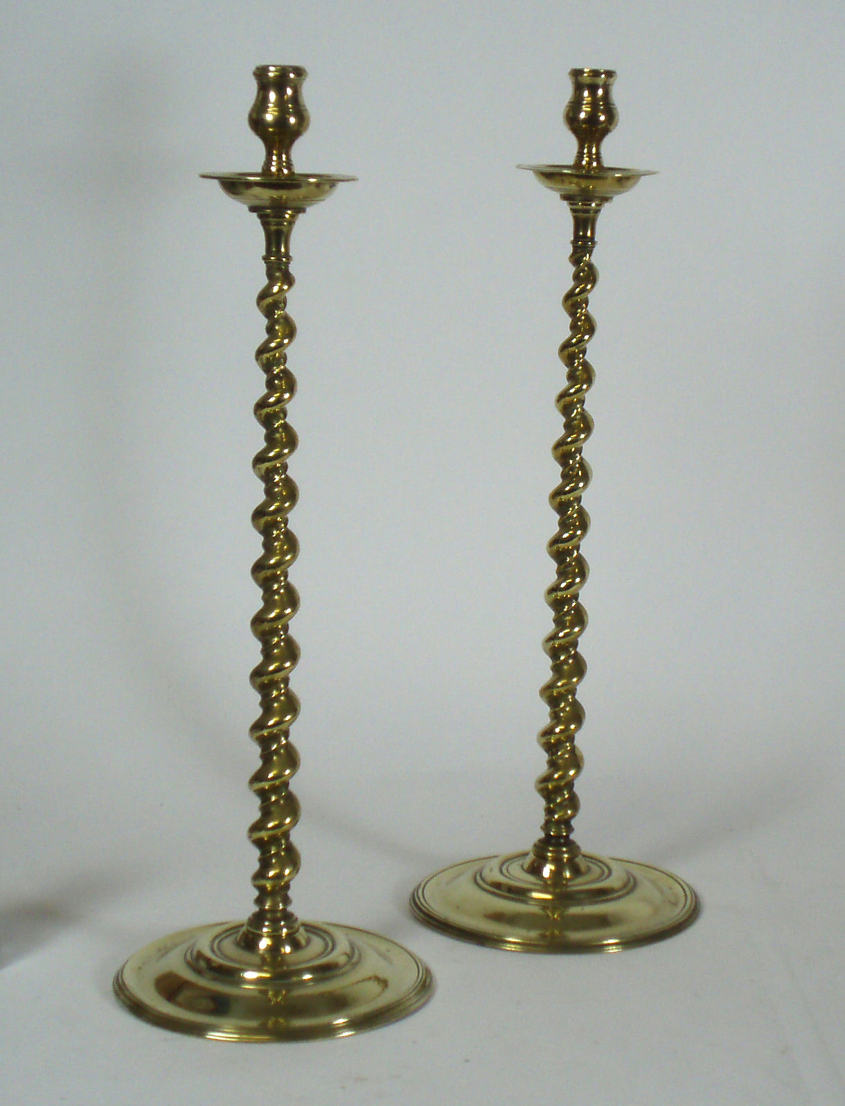 A pair of Regency candlesticks