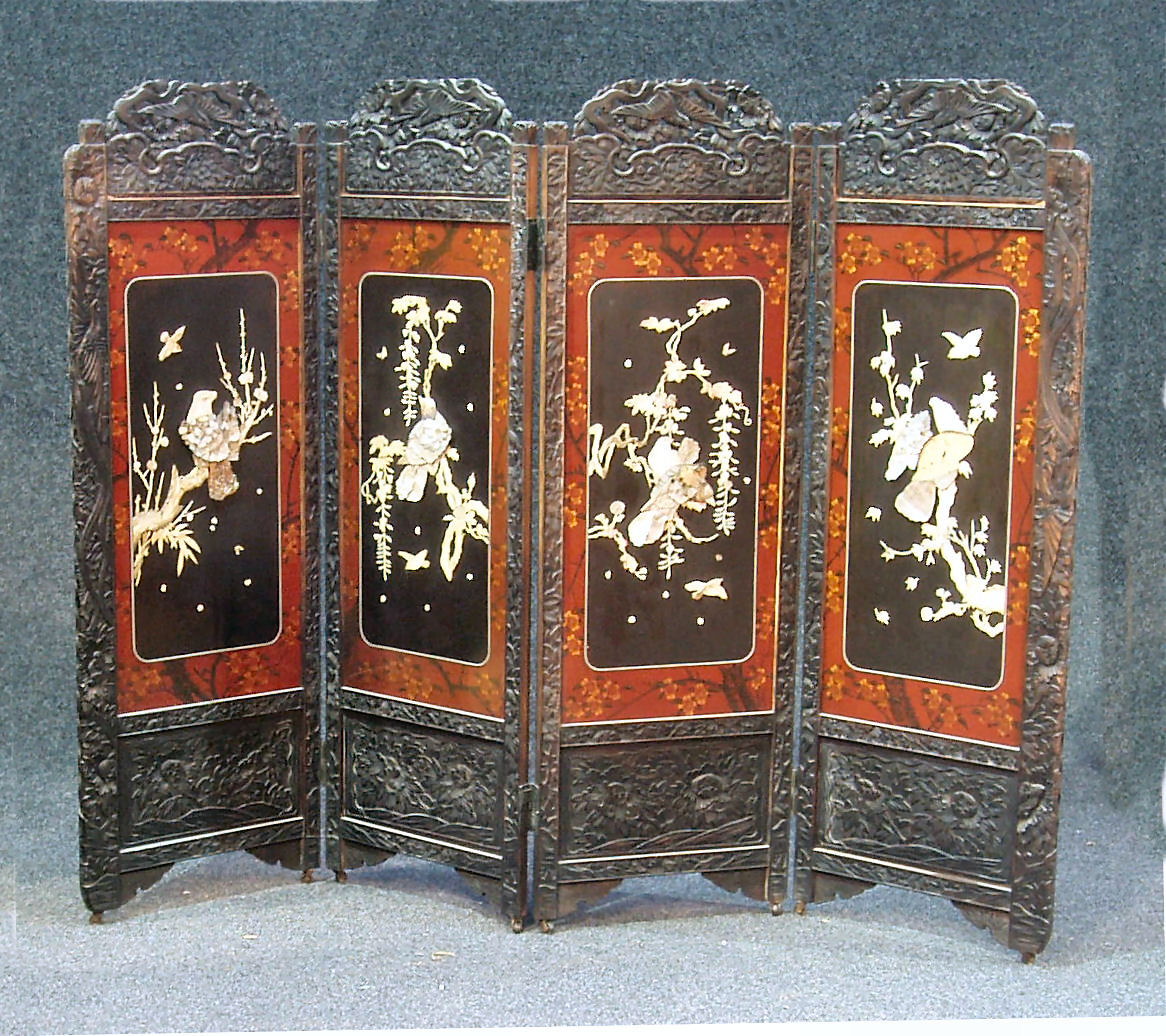 A Japanese lacquered four leaf draught screen,