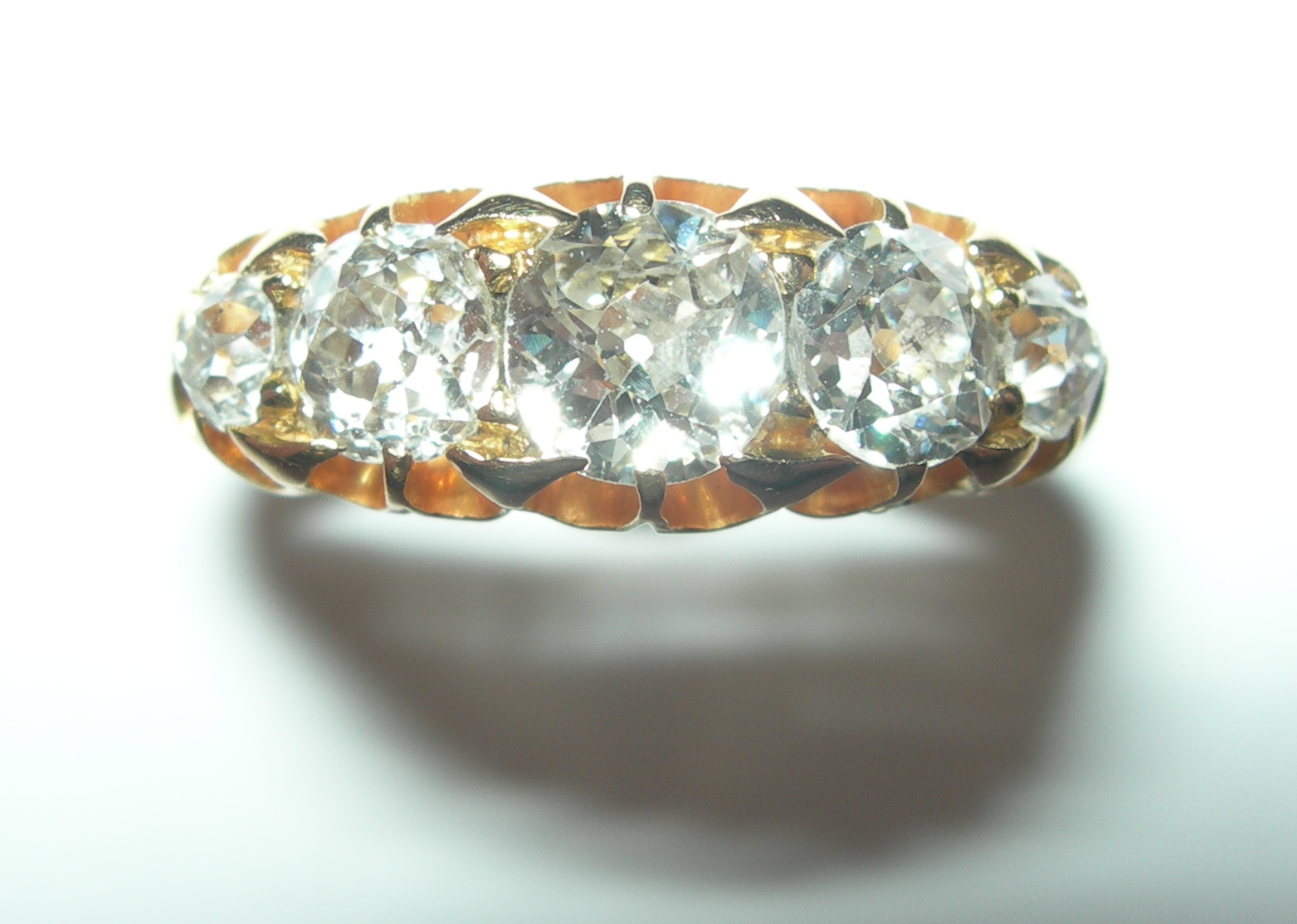 An 18ct gold mounted five-stone diamond ring,