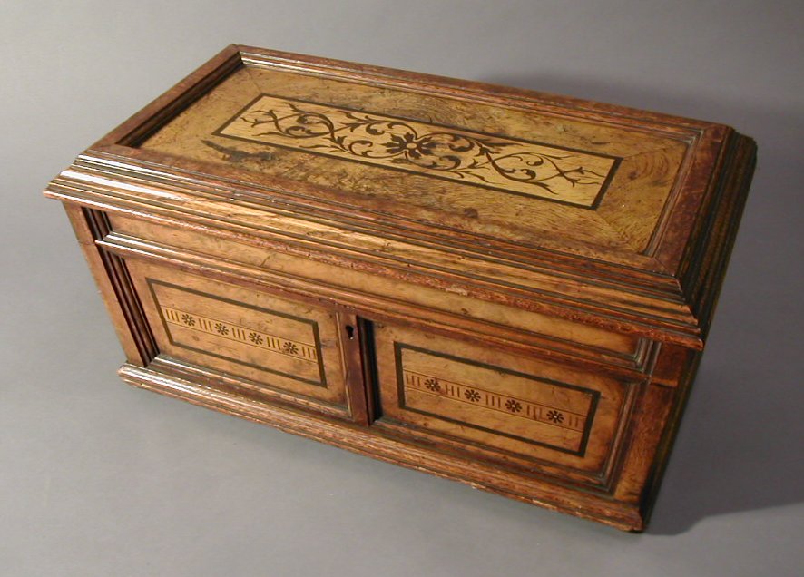 A Regency pollard oak and holly inlaid tea caddy