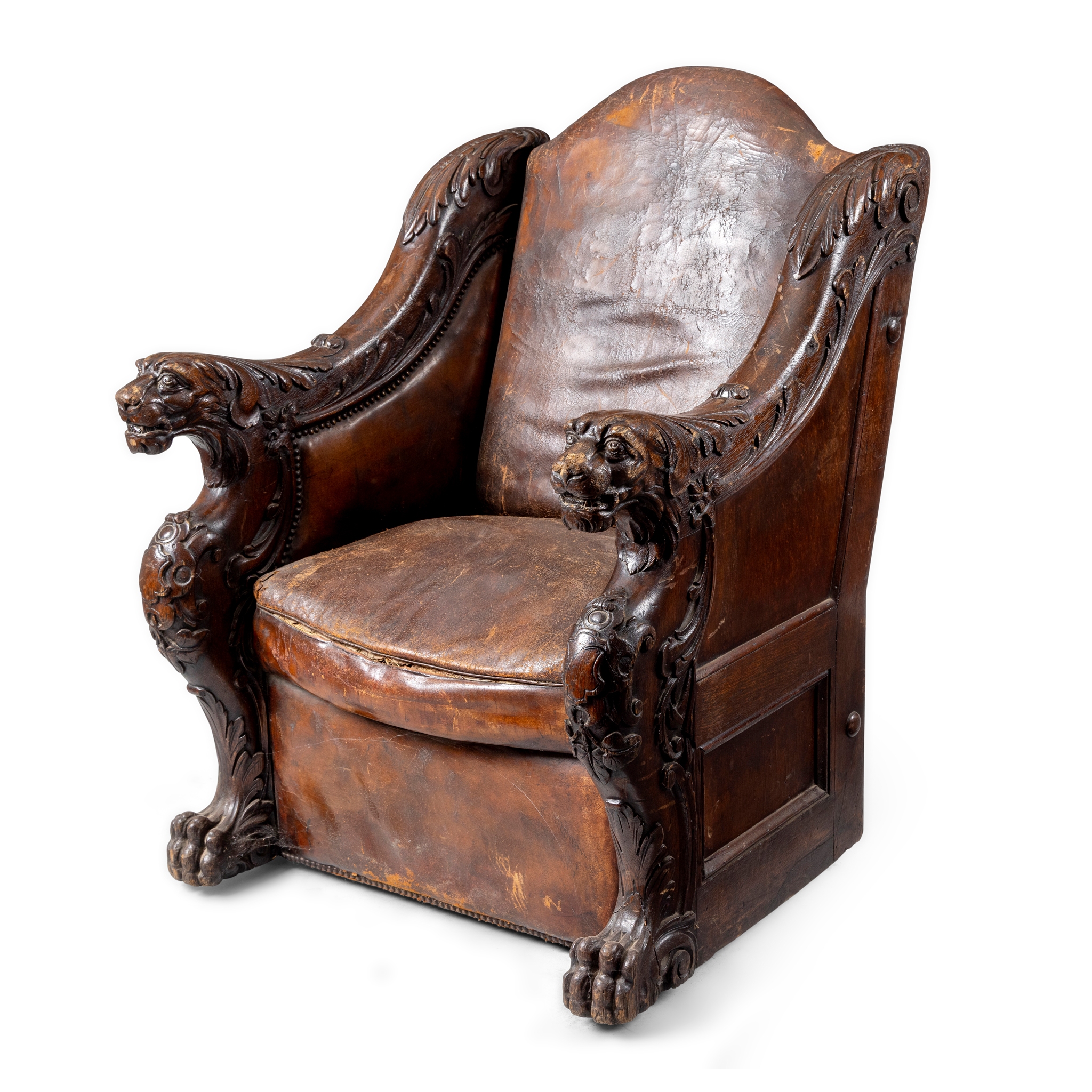 A VICTORIAN OAK ARMCHAIR OF LARGE PROPORTIONS
