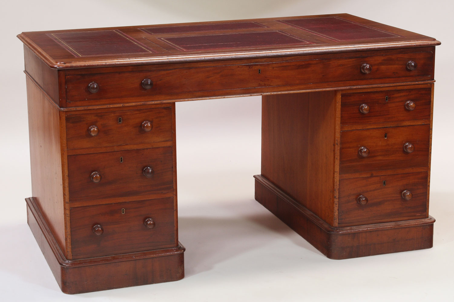 A late 19th century mahogany twin pedestal desk