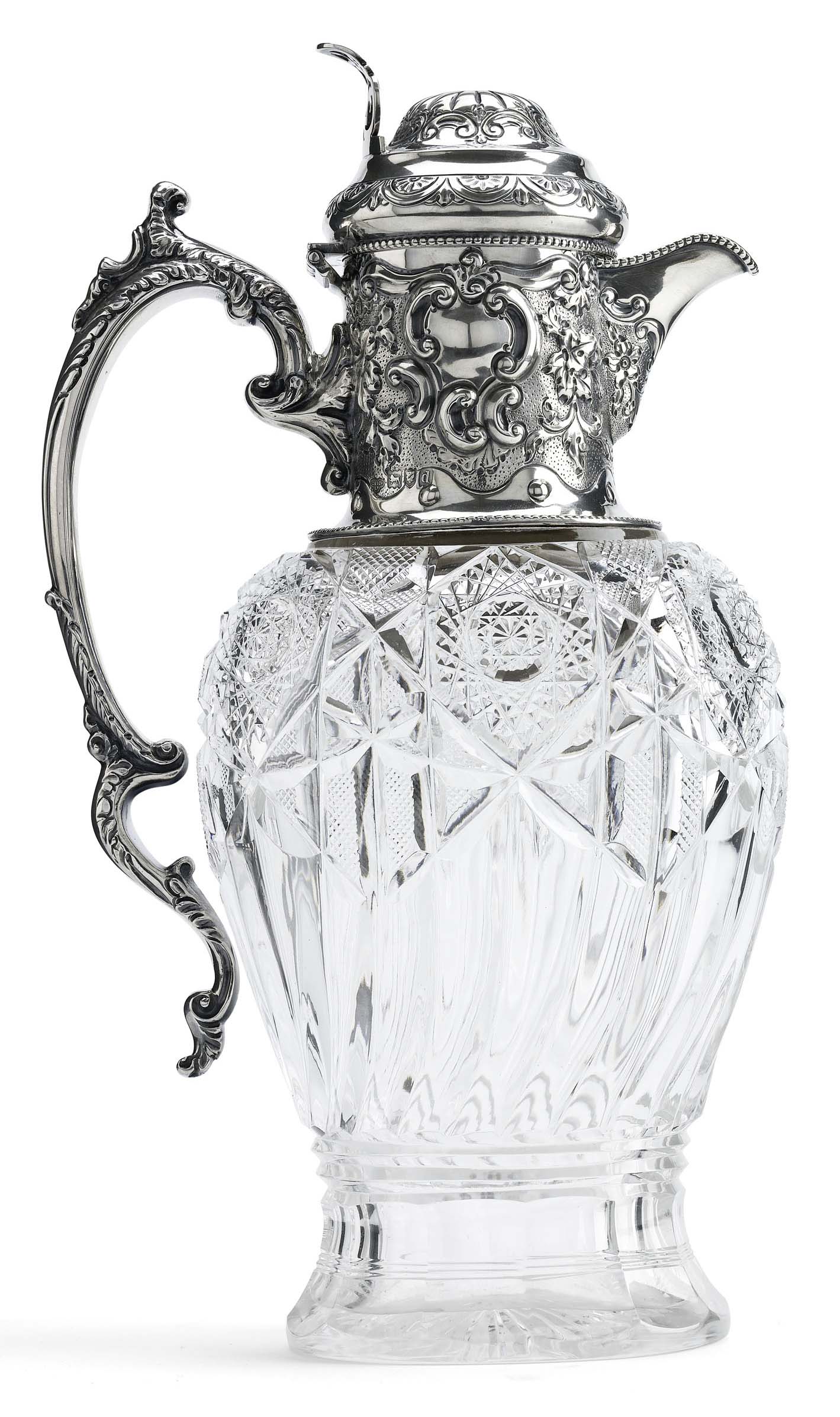 A late Victorian silver mounted claret jug